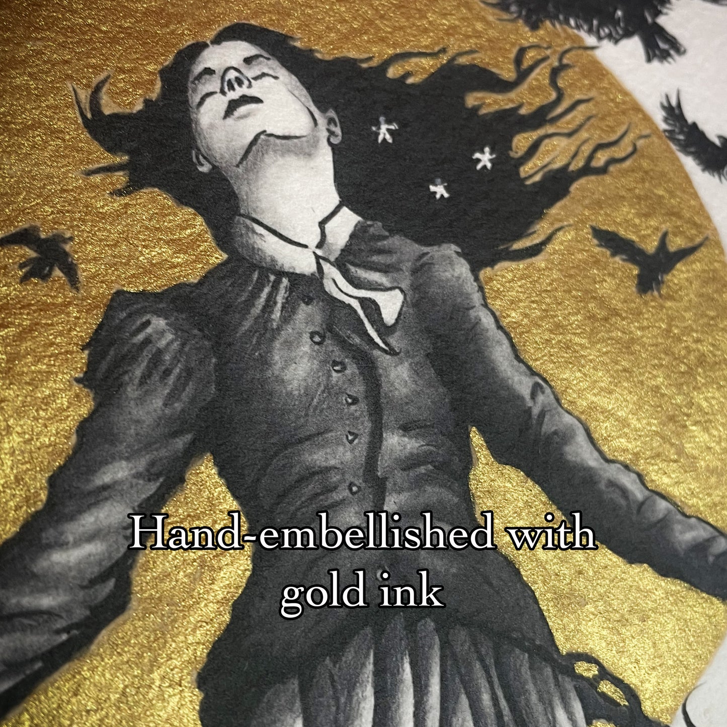 A detail of Madam Bird showing the gold ink that is hand applied by the artist