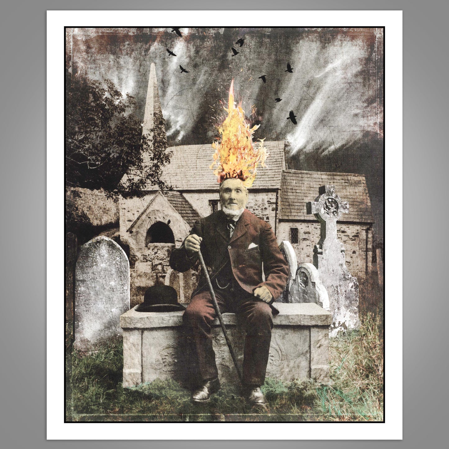Man with flaming head sitting on a bench in a cemetery with a church in the background